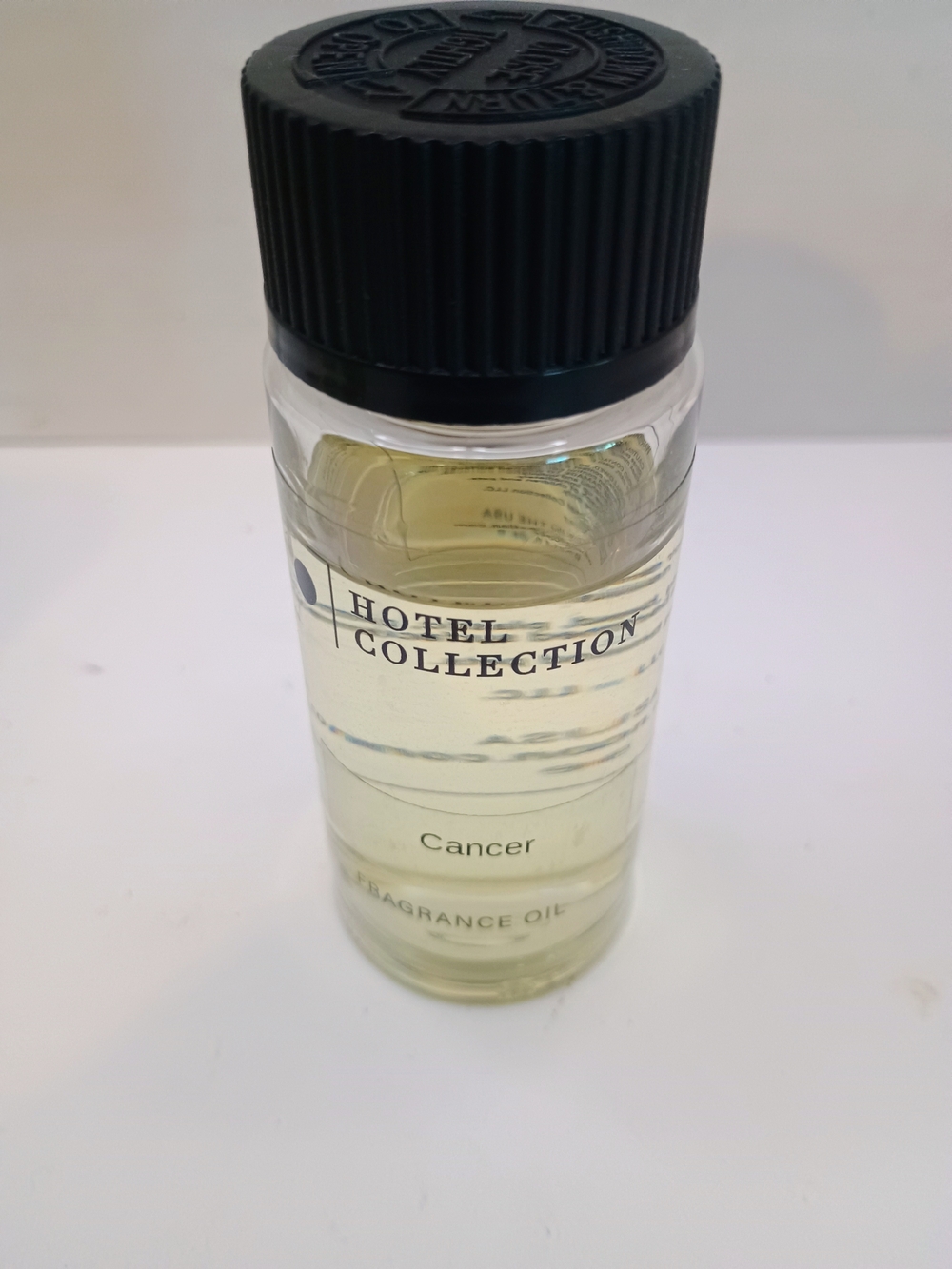 Hotel Collection Fragrance Oil Bottle with Black Cap and Pale Yellow Oil